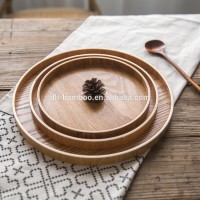 Round natural wooden cutlery serving tray